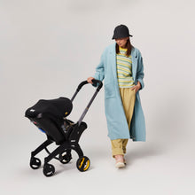 Load image into Gallery viewer, Doona Infant Car Seat &amp; Base - Nitro Black
